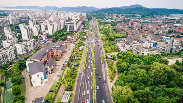 Aerial view of Tambaram showcasing major road connectivity, residential developments, and green surroundings ideal for Tambaram land investment